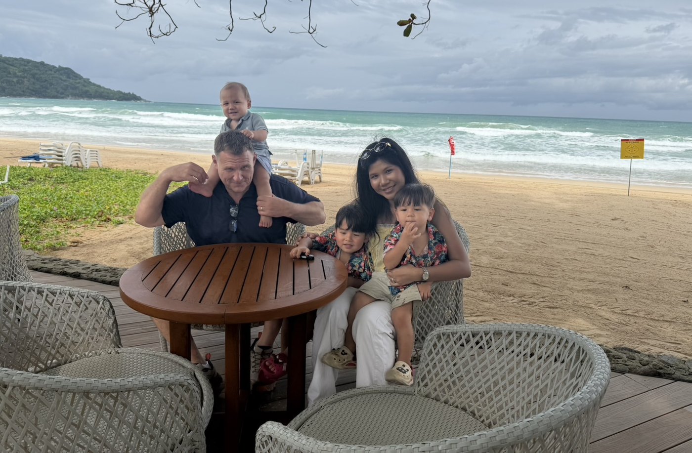 Ben and Ploy Cunningham with their three sons, on a beach in Thailand, September 2026